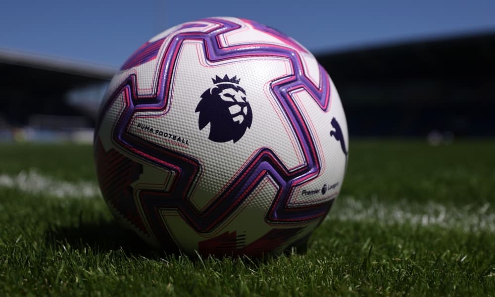 Professional football governance meeting with officials reviewing the Football Governance Act 2025 documents, representing the regulatory transformation bringing accountability and transparency to English football